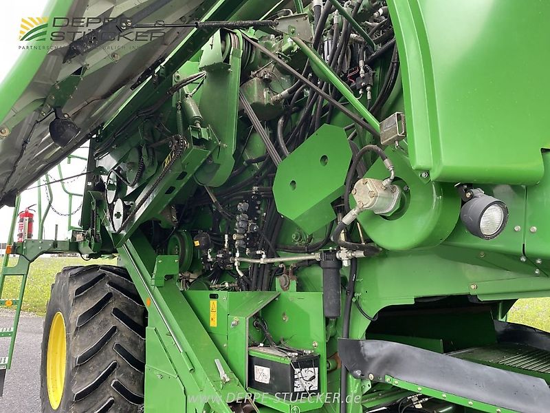 John Deere T560 HillMaster mit 620R und Rapstisch