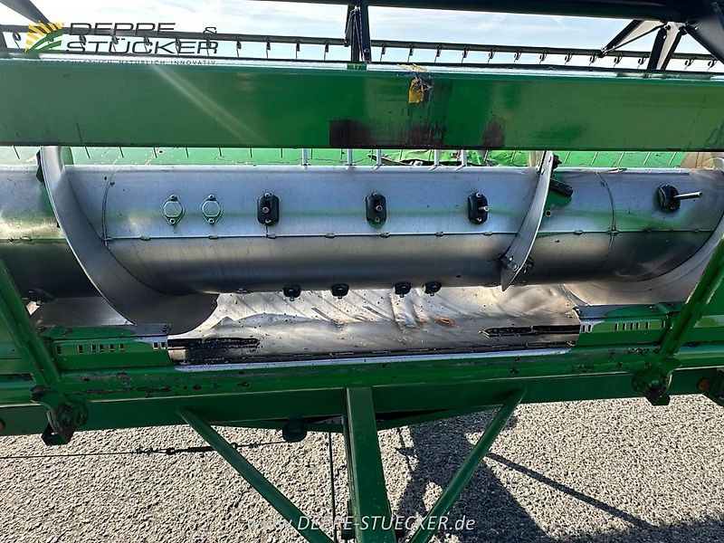 John Deere T560 HillMaster mit 620R und Rapstisch