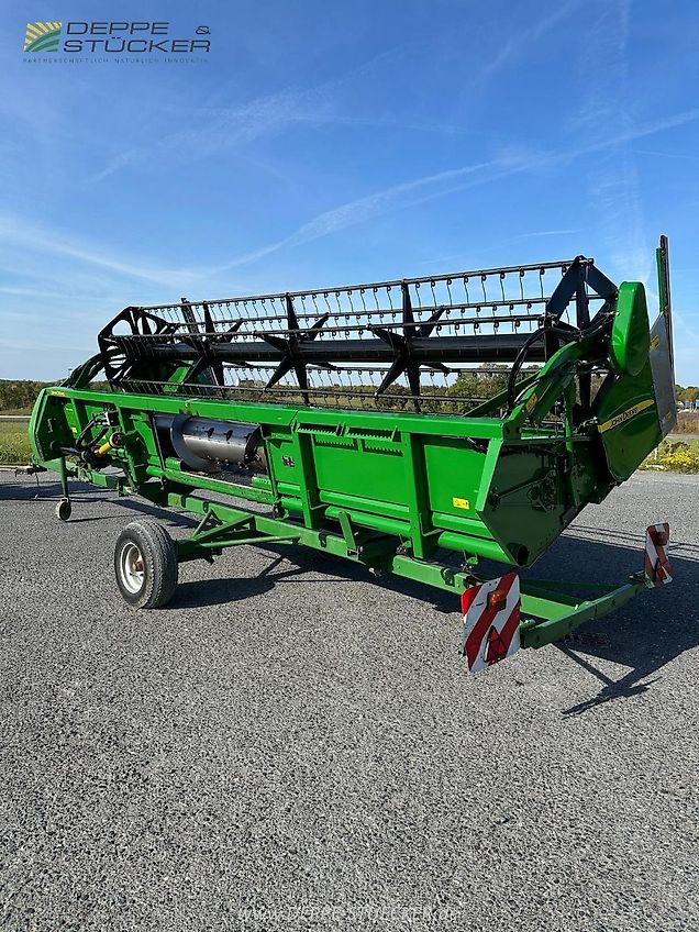 John Deere T560 HillMaster mit 620R und Rapstisch